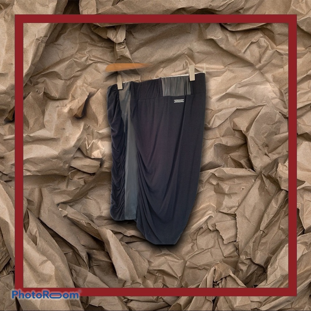 Nor of Denmark black skirt w/ faux leather trim.